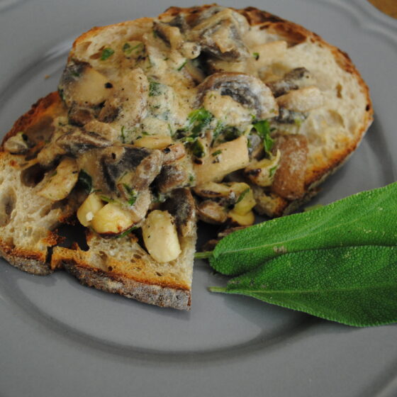 Sour dough toast, creamed mushrooms and cobnuts